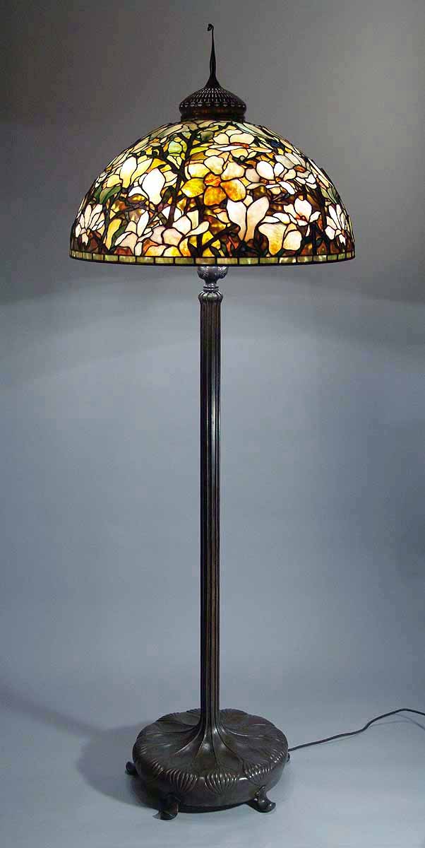 he 28" Magnolia Tiffanylamp #1599 and Senior bronze lamp base #376