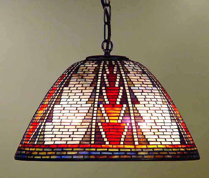 AMERICAN INDIAN LEADED GLASS AND BRONZE TIFFANY LAMP