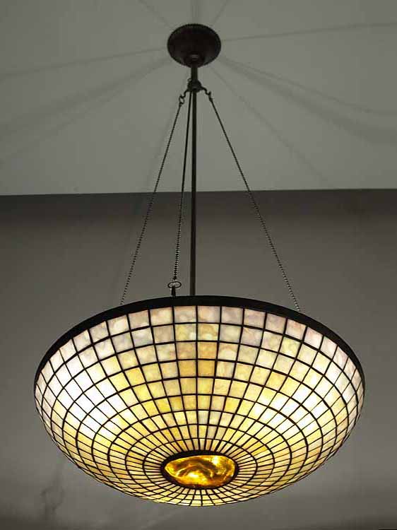 20" Parasol leaded glass and bronze Tiffany chandelier #1520-20 with Turtleback glass tile centerpiece.