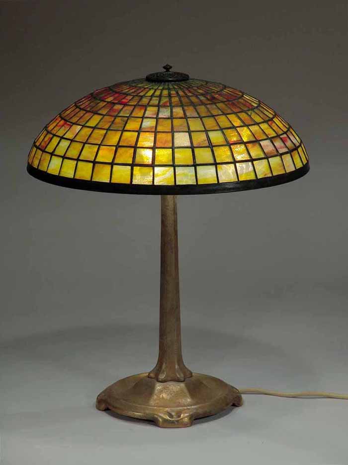 GOD DORE LEADED GLASS AND BRONZE TIFFANY LAMP