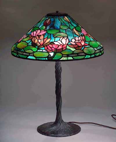 20" TIFFANY WATERLILY LAMP ON A TWISTED VINE BASE.