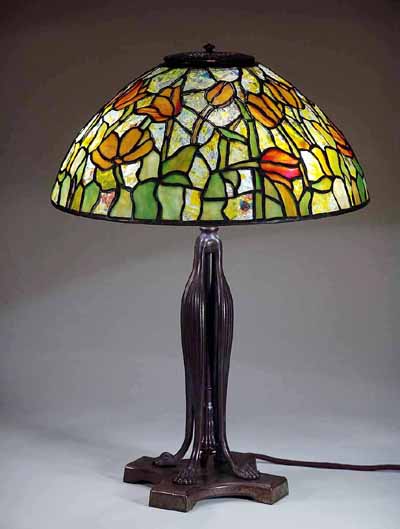 16" Tulip Tiffany lamp on a telescoping bronze cast lamp bas